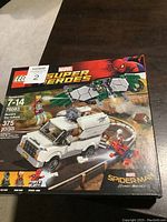 Front of the Lego Marvel Superheroes 76083 Beware the Vulture box showing the assembled set with vehicle and flying Vulture figure.