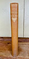 Spine of the hardcover book showing the title 'Life and Speeches of Hon. Geo. Brown' in gold lettering on brown binding.