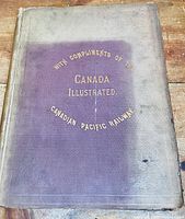 Front cover of the 1889 Canada Illustrated book, showing title and Canadian Pacific Railway compliments in gold embossing on a purple faded cloth background.