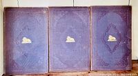 Front covers of three purple hardcover History of England books showing embossed design and gold lion emblem.