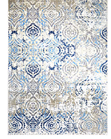 Top-down view of the rectangular area rug with a detailed pattern in blue, gray, beige, and white.