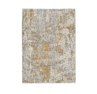 Full view of the Kamella medium-sized flat weave area rug featuring a predominantly gray base with gold and beige abstract accents creating a distressed look.