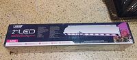 Box for Feit Electric 2ft LED grow light showing brand, size, and features.