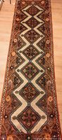 Full view of runner showing diamond medallion pattern