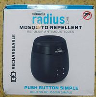 Front view of product box showing the device image, brand (Thermacell), product line (Radius), and rechargeable feature with simple push button control.