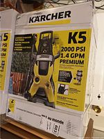 Front of sealed box showing Karcher logo, model K5 Premium, 2000 PSI, 1.4 GPM.
