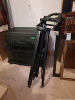 Collapsed aluminum tripod with equatorial mount head