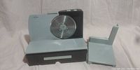 Full view of Rival meat slicer showing the main platform, blade, and base