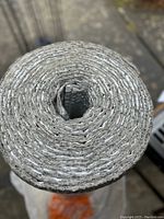 Top view showing the rolled double bubble reflective foil insulation showing its texture and hollow core