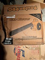 Box of Poulan Pro gas blower showing branding, model features and image of product.