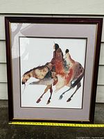 Full view of framed watercolour painting showing two Native American figures riding a horse.