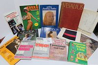 Full view of all vintage books arranged on the floor to show the collection.