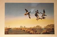 Photo of a painting showing six mallard ducks flying into the wind against a marsh landscape background with water and distant trees; image set in warm light.