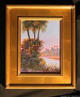 Framed small original acrylic painting by Robert Binks showing a Florida landscape in vertical format with palm trees and water.