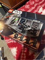 Photo of sealed Lego Star Wars set 75318 box featuring Luke Skywalker, Dark Trooper, and Dark Troopers in a Death Star duel microfighter scene.