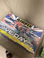 Boxed Airfix VE Day 60th Anniversary plastic model kit with colorful cover artwork depicting WWII scenes