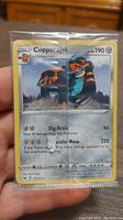 Front of Copperajah Pokémon card showing artwork, HP, moves Dig Drain and Spectacular Nose.