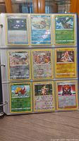 Photo showing a page of 9 Pokemon cards including Poliwag, Politoed, Staravia, Steelix, Magmar, Braixen, Combusken, Spinda, and Shadow Rider Calyrex.