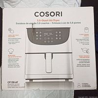 Box front showing Cosori branding, model CP158-AF, 5.8-quart capacity and key features