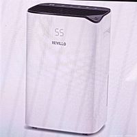 Front view of white Hevillo dehumidifier with black top and digital display.