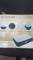 Box showing large queen size air bed dimensions and features including built-in electric pump, raised pillow, and durable PVC material.