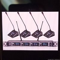 Four wireless gooseneck microphones and rack-mount receiver shown for detail of components and condition.