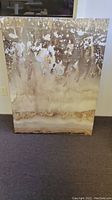 Full frontal photo of the rectangular modern abstract art with gold and green hues, showing entire canvas.