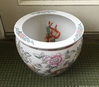 Top angled view showing interior koi fish painting and interior condition with some staining.