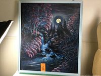 Frontal view of the large original canvas painting showing waterfall, trees, moonlight, and surrounding foliage in blues and pinks