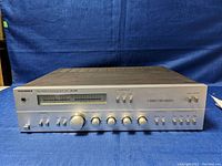 Front view of the Telefunken RA200 integrated amplifier receiver showing the full front panel with the peak level meter and multiple control knobs and switches.