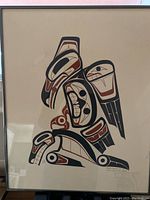 Framed print of Thunderbird and Seal with Indigenous art style shapes and colors