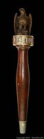 Full view of the vintage Michelob beer tap handle with carved eagle topper, wooden handle, and metal logo band.