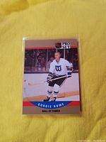 Front of Gordie Howe Pro Set Hall of Fame hockey card showing player skating in Hartford Whalers uniform.