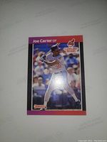 Front side of Joe Carter 1988-89 baseball card showing player in batting stance with Cleveland Indians logo.