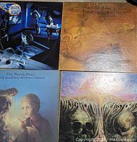 Five vinyl album covers displayed, including Moody Blues, To Our Children's Children's Children, Every Good Boy Deserves Favor and In Search of the Lost Chord albums.