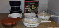 Full view of all cookware items including pots, baking dishes, containers and lids