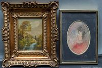 Two framed paintings side by side, one in a large ornate gold frame and the other in a smaller simpler frame with an oval mat.