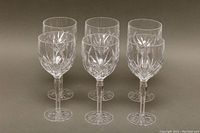 Front view showing all six Waterford Marquis cut crystal wine goblets arranged in a group.