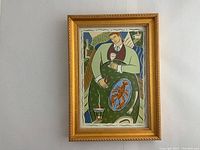 Front view of the gouache painting in frame, showing full artwork and ornate golden frame