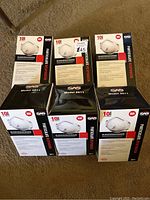 Six boxes of SAS Safety Model 8611 N95 particulate respirator masks, each box containing 10 masks, pictured unopened and new.