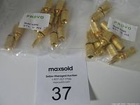 Two bags of 10 gold plated Provo banana plugs sealed in plastic, labeled Model A269G, quantity 10 each.
