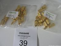 Two sealed plastic bags containing 10 Provo gold plated banana plugs each, with labels showing model A269G and quantity 10.