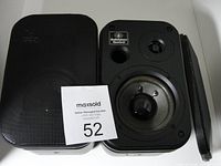 Two small AudioSphere Research speakers, one with grille, one with grille removed showing driver and bass port.