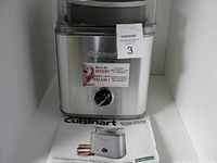Front view of the Cuisinart ice cream maker with brand labeling and control dial