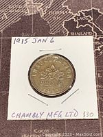 Front side of the inauguration token showing maple leaf, date JAN. 6 1915 and text INAUGURATION