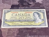 Front side of the 1954 Canadian 20 Dollar banknote showing Queen Elizabeth II portrait and denomination details.
