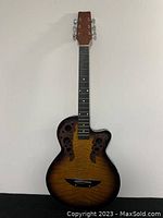 Full front view of the guitar showing body, fretboard, and headstock.
