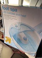 Box shot of the unopened Up&Up Target Foot Spa showing product image and features such as bubbles and heat