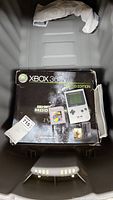 Xbox 360 MW2 box top view alongside Game Boy Pocket and game cartridges