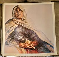 Full view of the lithograph print depicting an old indigenous woman wearing a white shawl, sitting with hands crossed on lap.